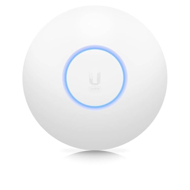 Punto de acceso Ubiquiti UniFi 6 Lite, pequeño, redondo y blanco, en un techo